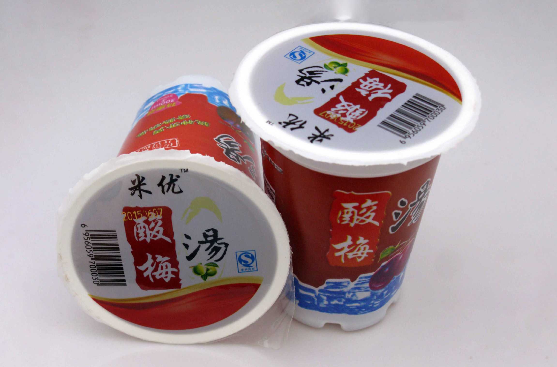 飲料工廠高效封口解決方案:工業(yè)化杯裝飲料封口機(jī)